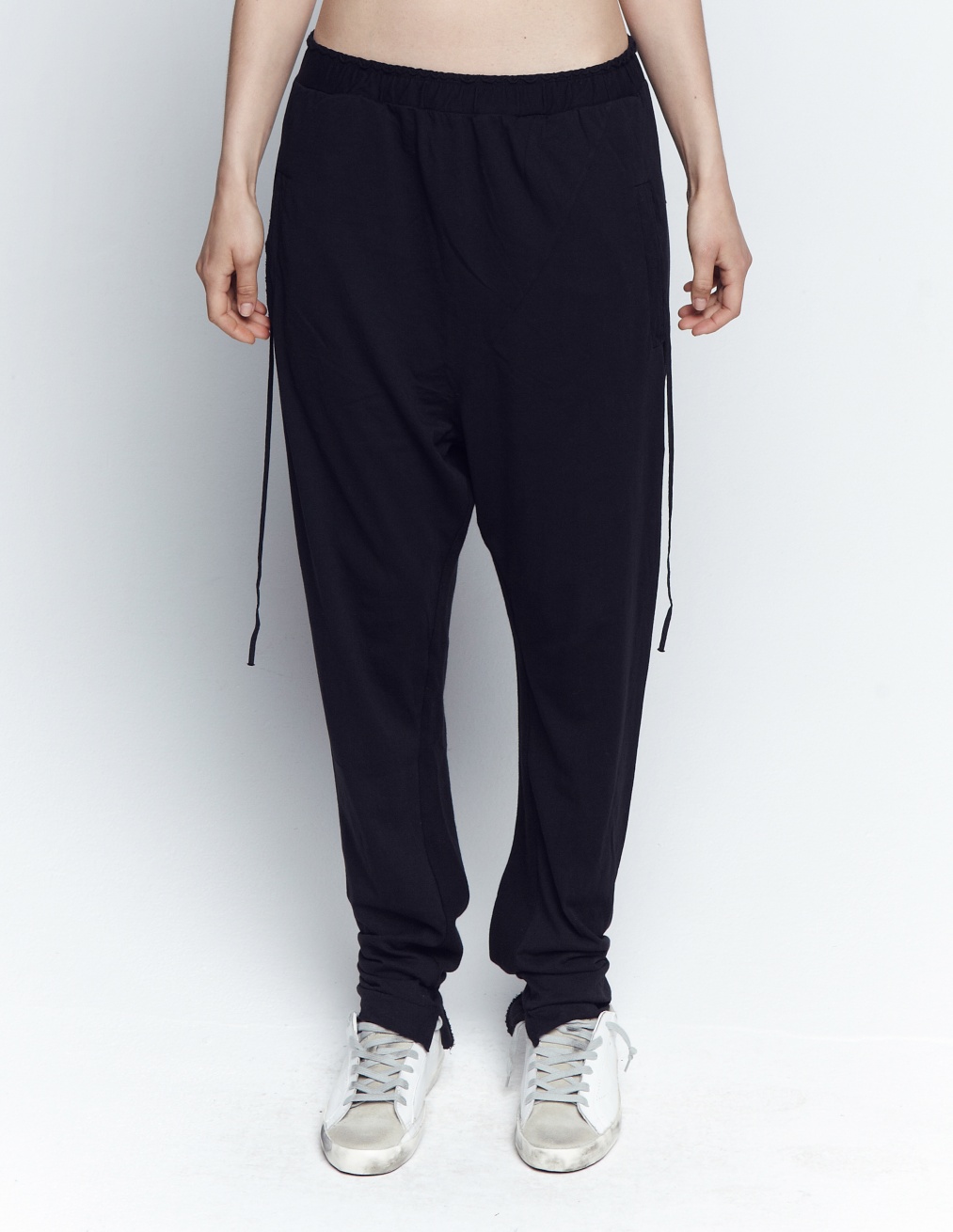 Buy Lost&Found women black drop crotch trousers for $385 online on